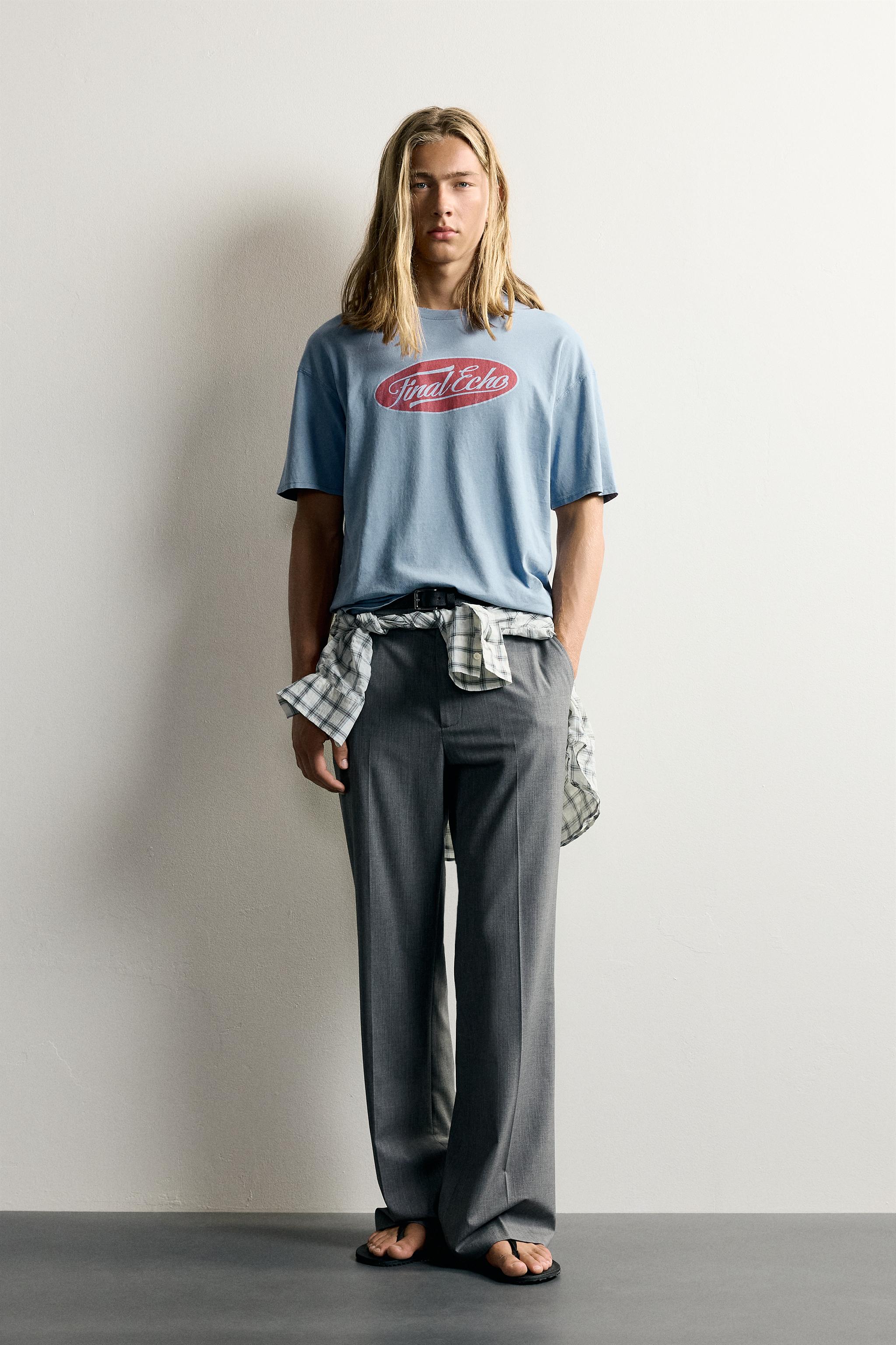 T-SHIRT DÉLAVÉ À IMPRIMÉS
